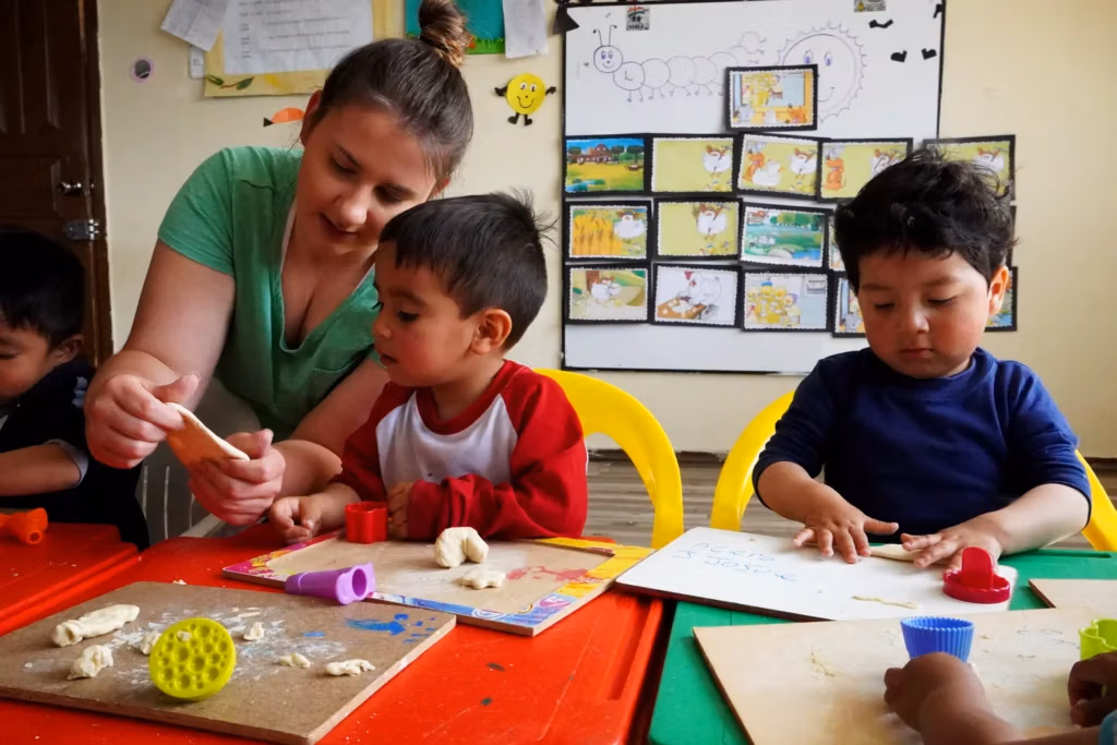 Volunteer teaching English in a classroom