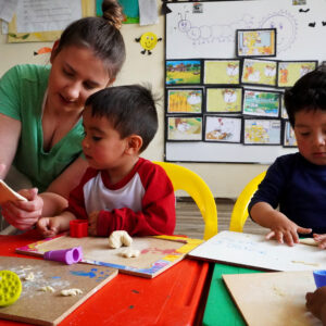 Volunteer teaching English in a classroom