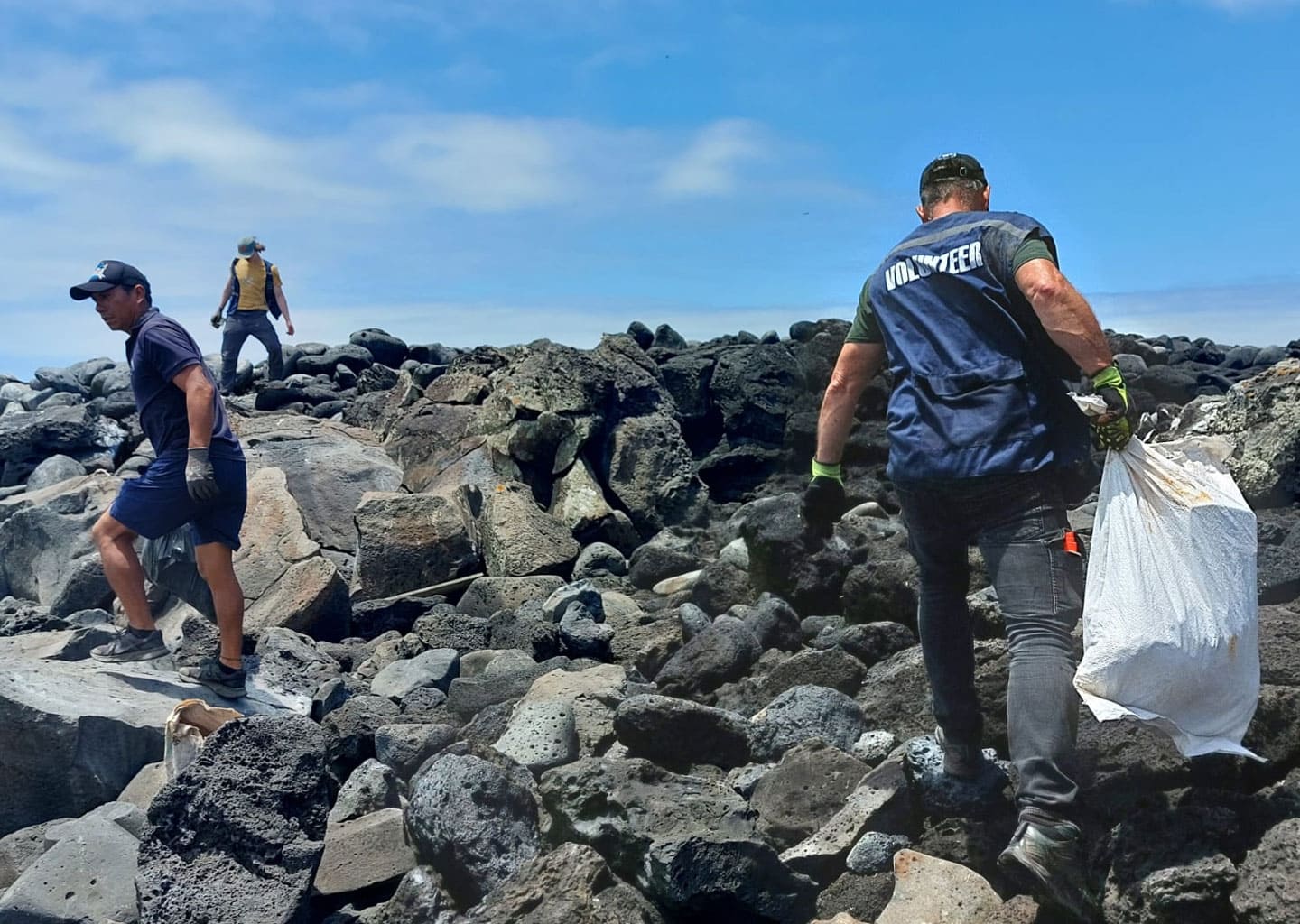 Picking up trash from San Cristobal Island in the Galapagos archipelago.