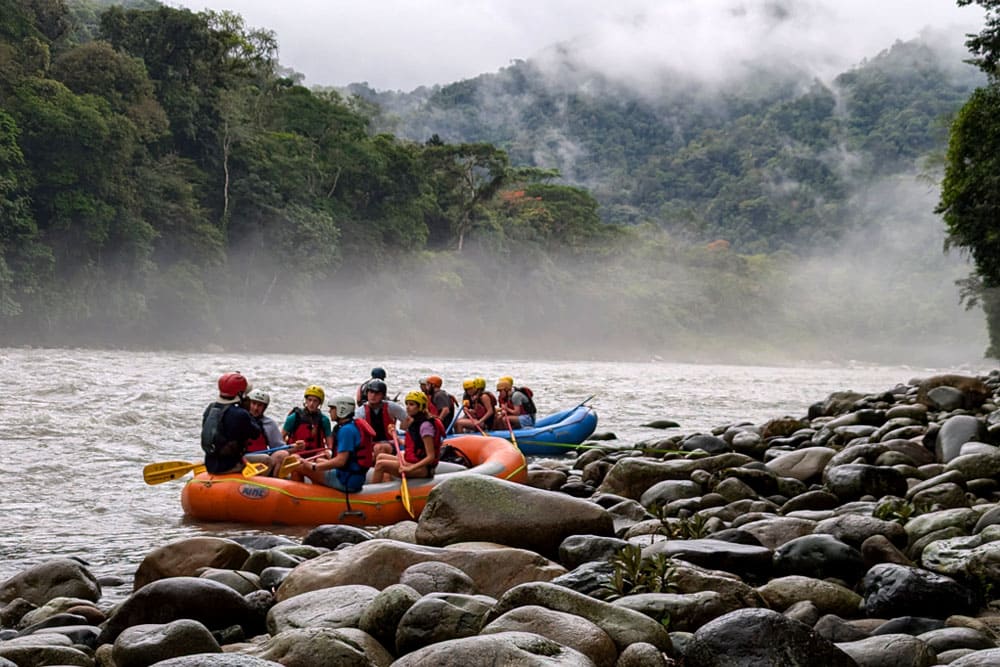 Group of TEEN CAMP youths preparing for rafting in the Amazon.