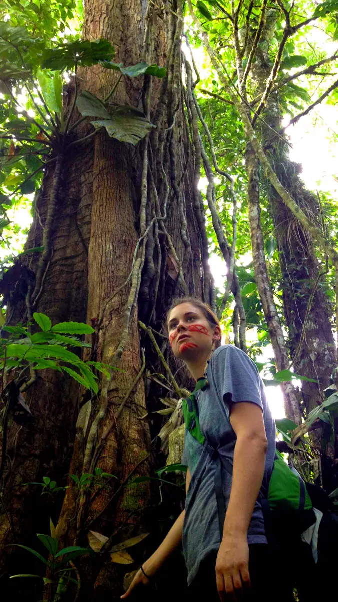 Teen exploring Amazon jungle during summer camp in Ecuador