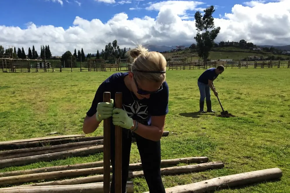 Teen participant building an outdoor project during leadership camp in the Ecuadorian Andes