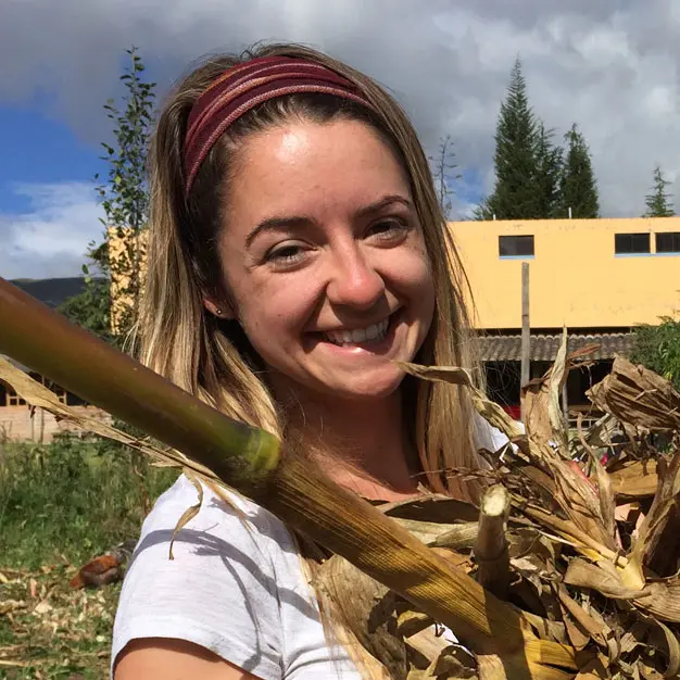 Smiling teen participant during a transformational travel experience in Ecuador