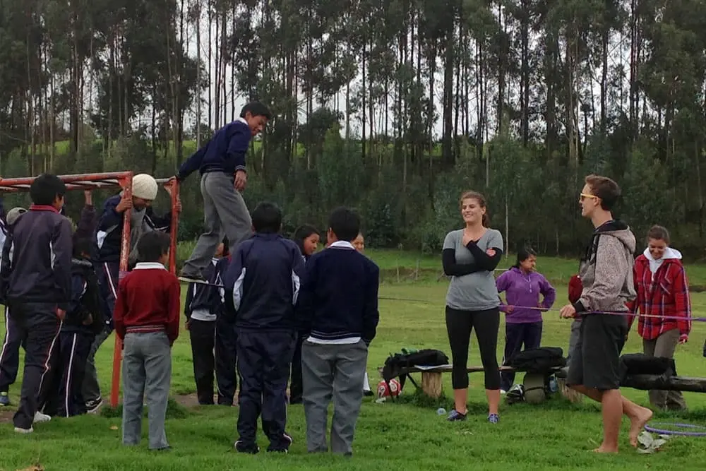 Teen leaders facilitating activities with local students in the Ecuadorian Andes