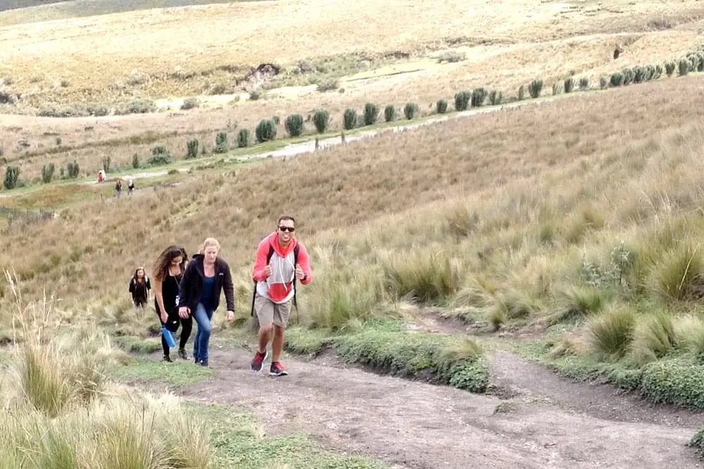Teen participants hiking through Andean trails during a leadership program in Ecuador